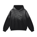Front view of a black 400GSM heavyweight sunfade oversized hoodie with a white line art character graphic and front pocket.