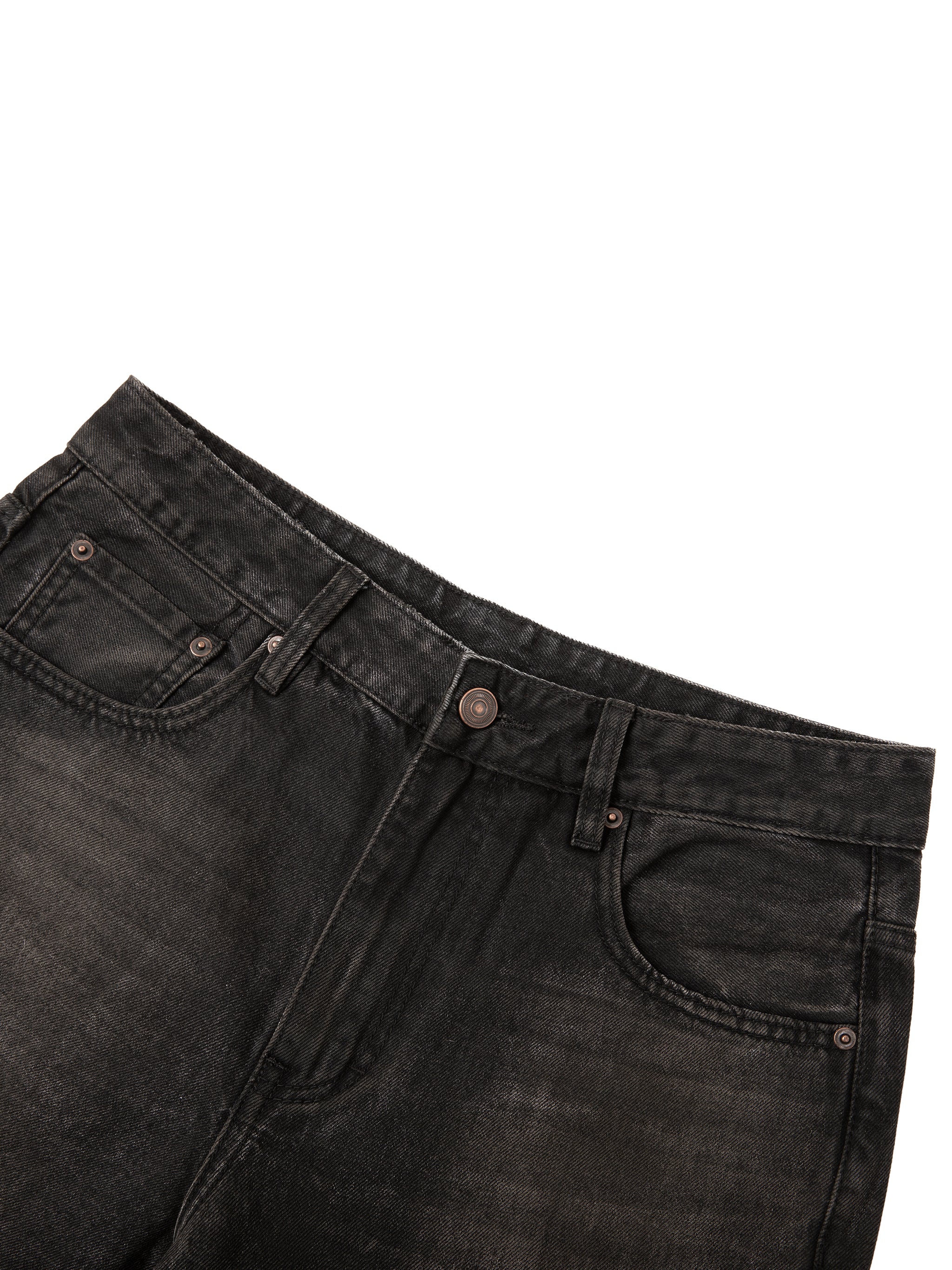 Close-up of Men's Vintage Wash Heavyweight Denim Jeans in black featuring a loose fit, waistband, and metal button.